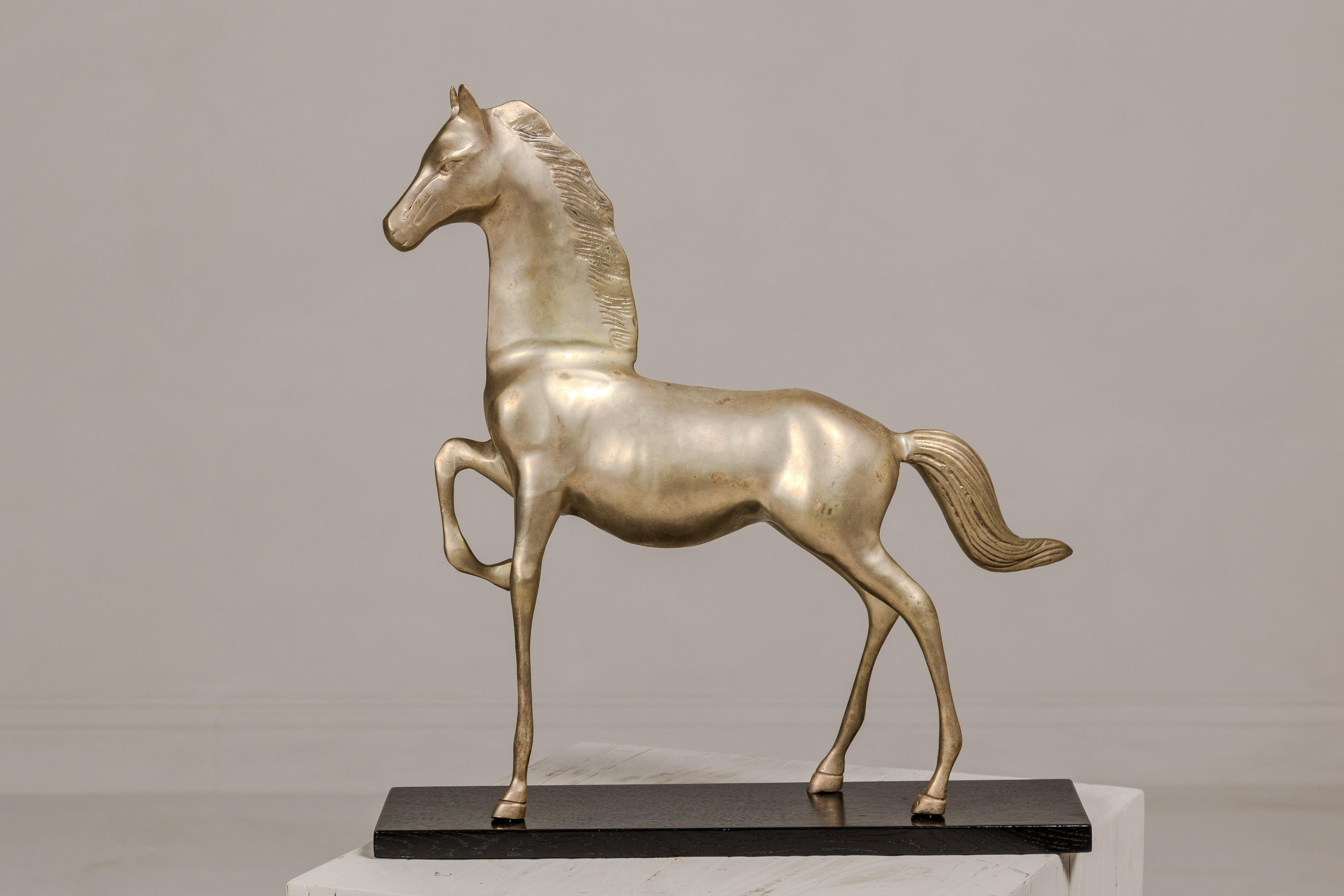 striding horses statue