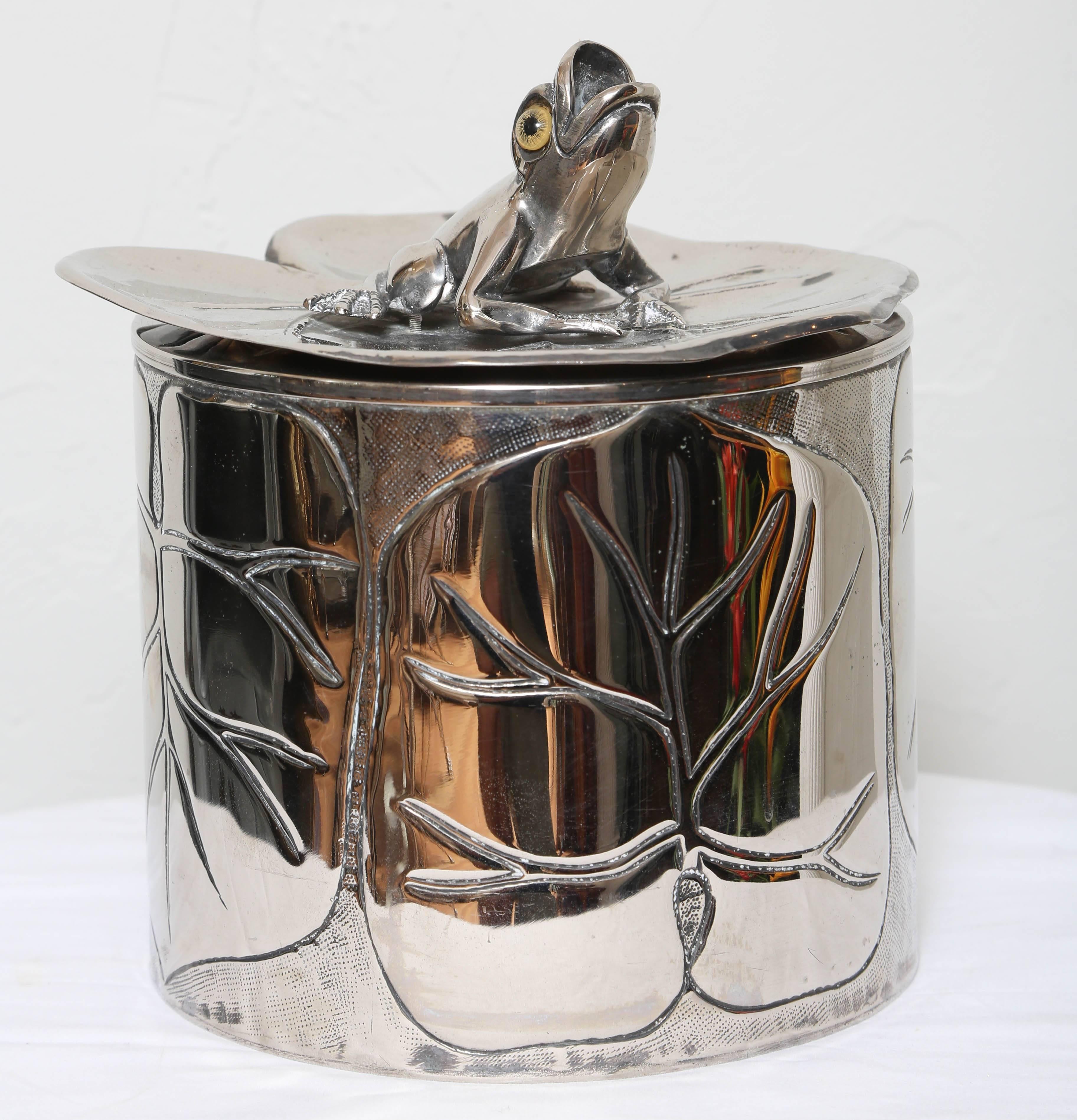 Silver plate engraved lily pad ice bucket.