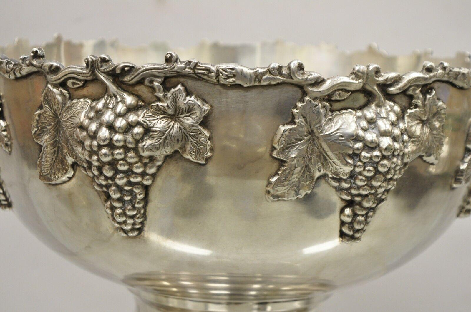 Vintage silver plate grapevine grape cluster punch bowl champagne wine chiller bucket. Item features a grape cluster pattern throughout, very nice vintage item, unmarked, great style and form. Circa mid 20th century. Measurements: 11