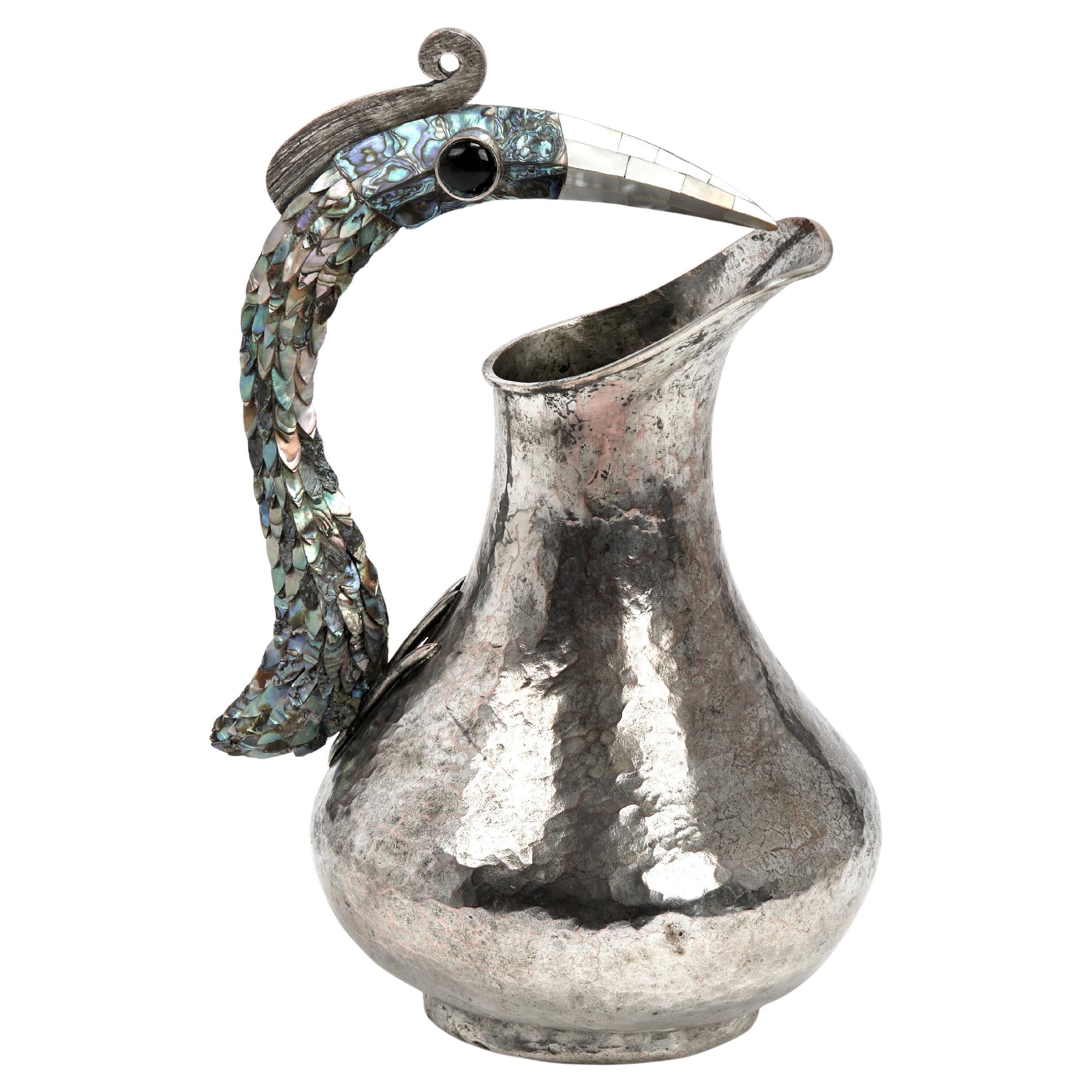 Jarra vintage de plata con asa de pájaro de Los Castillo