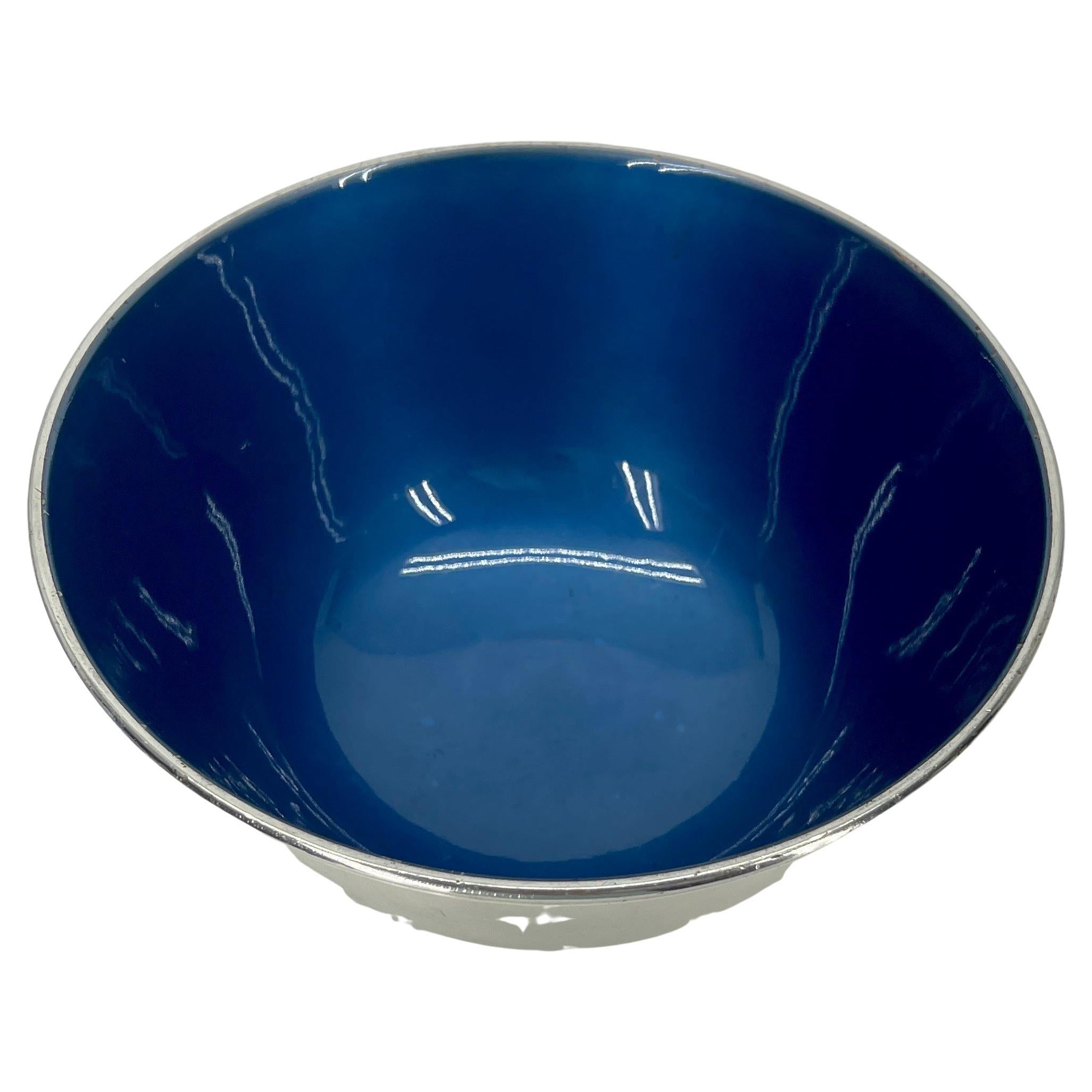 1960's silver plate bowl with ocean blue enamel by Towle.
The bowl is marked TOWLE E.P. 5003.