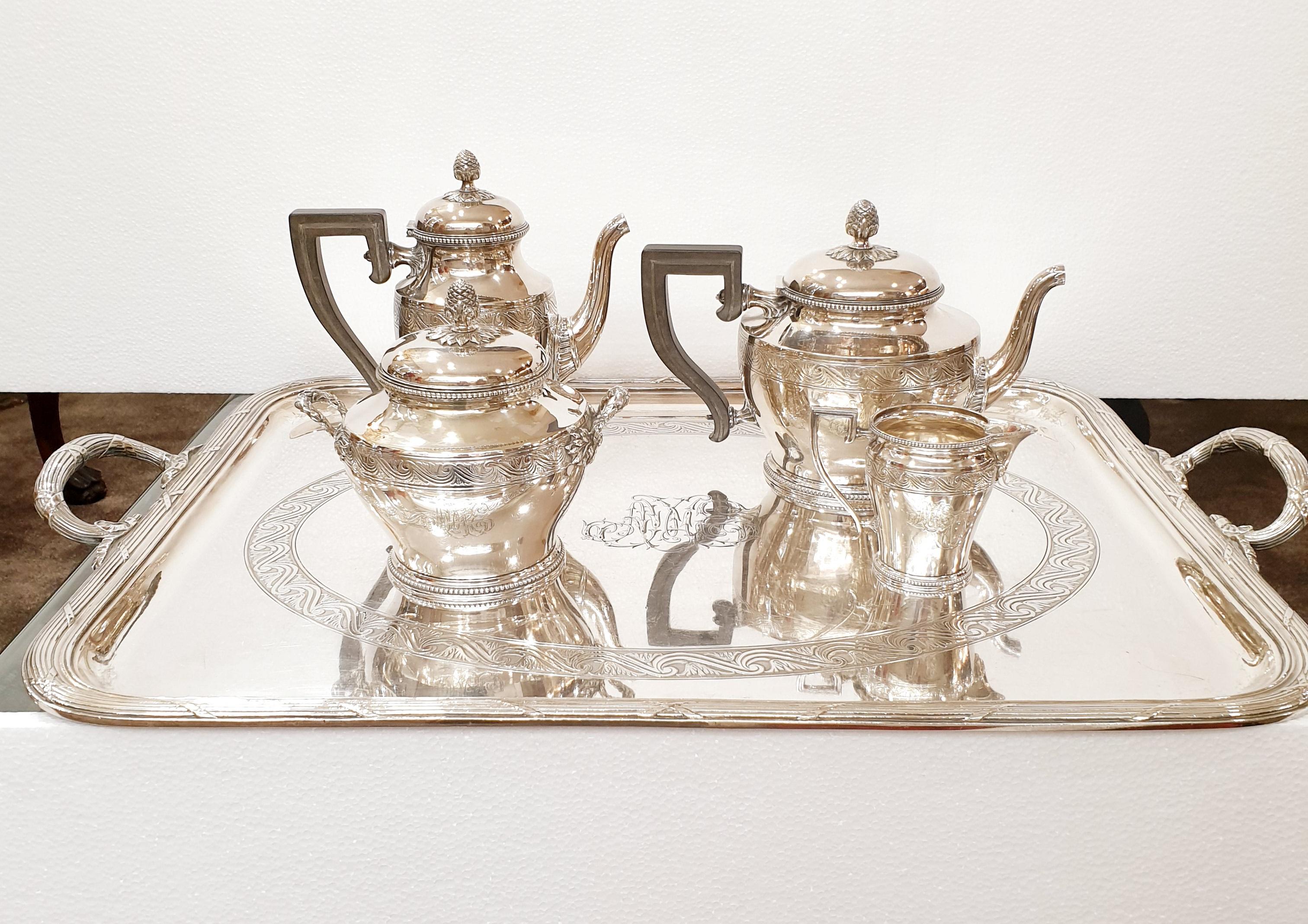 Marvelous Christofle Tea and Coffee Set with Ebony Handles
Set of five silver plated service, consisting of mocha and teapot with ebony handles, cream jug, sugar tray and tray, on the underside punctured company name.  With beautiful classic
