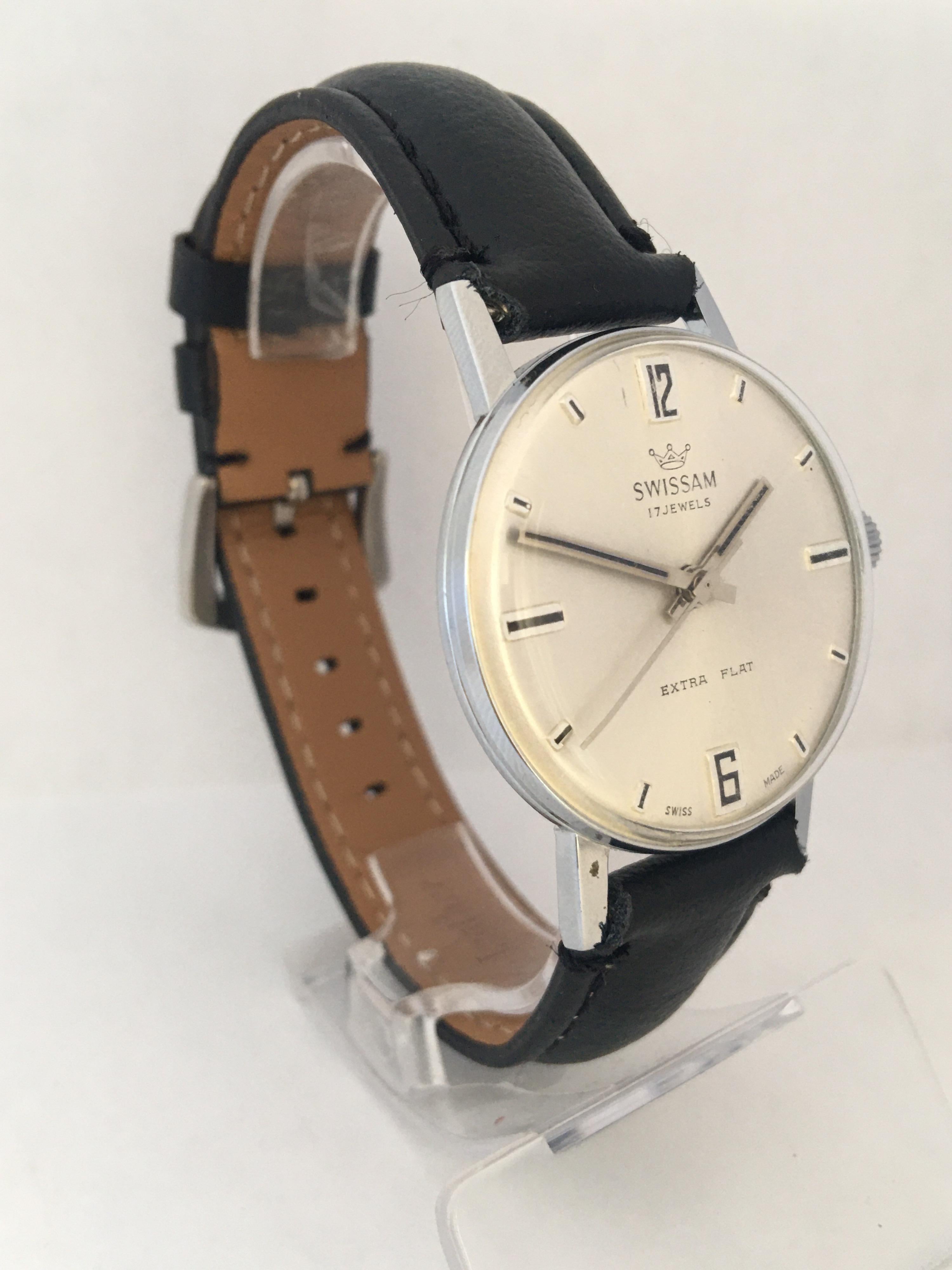 This classic pre-owned 34mm diameter hand winding watch is in good working condition and it is running well. Beautiful silvered finished dial and it’s watch case and it is fitted with new black leather strap as shown. 

Please study the images