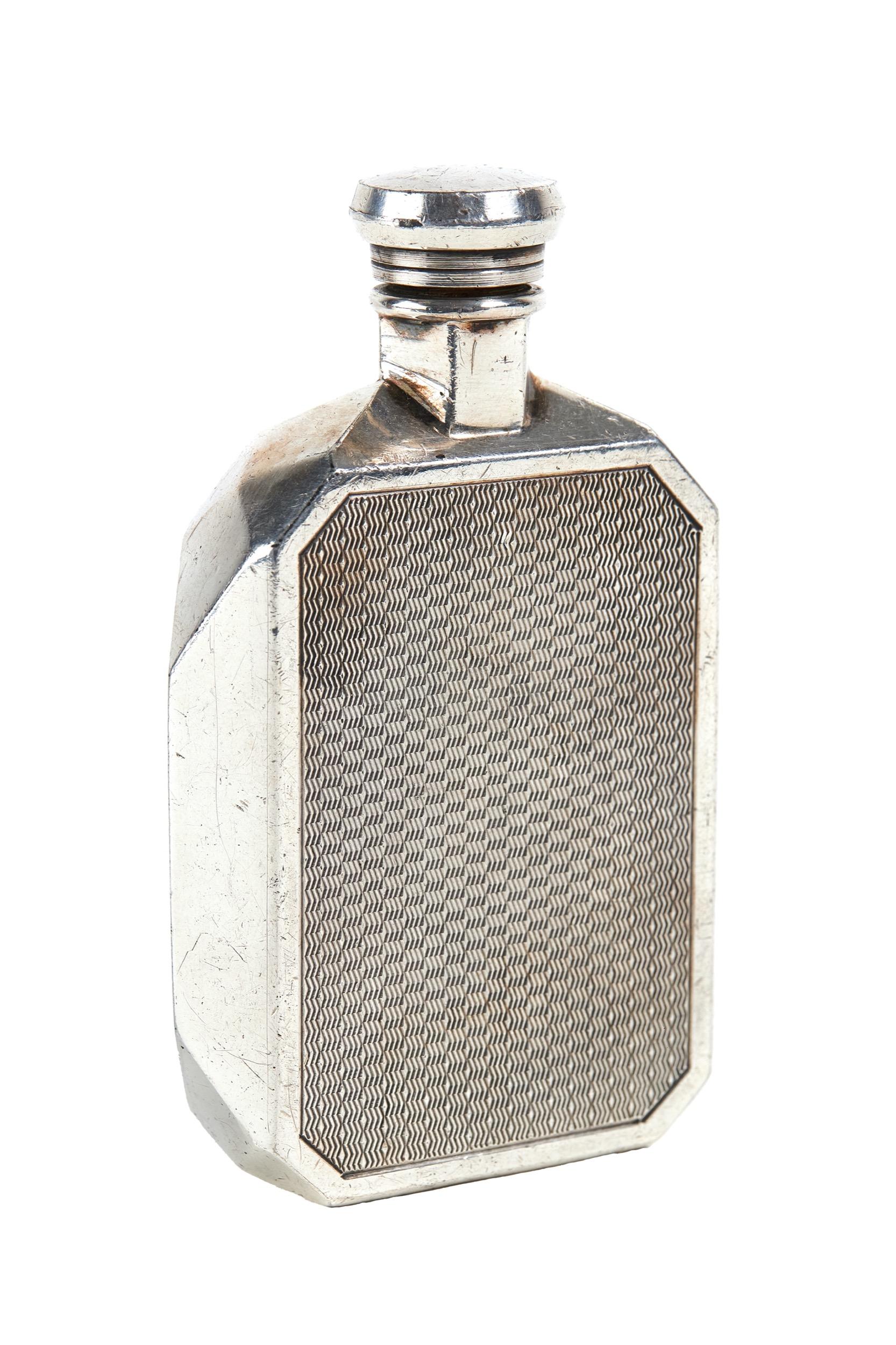 Vintage Silver plated Hip Flask 
In the Form of a 1920s Vintage Car Radiator
Screw cap, 
Stylised radiator shell,
Engine Turned Detail on Radiator Core
by James Dixon & Son Sheffield
stamped on base J D &s with trumpert mark
EPNS MADE IN ENGLAND