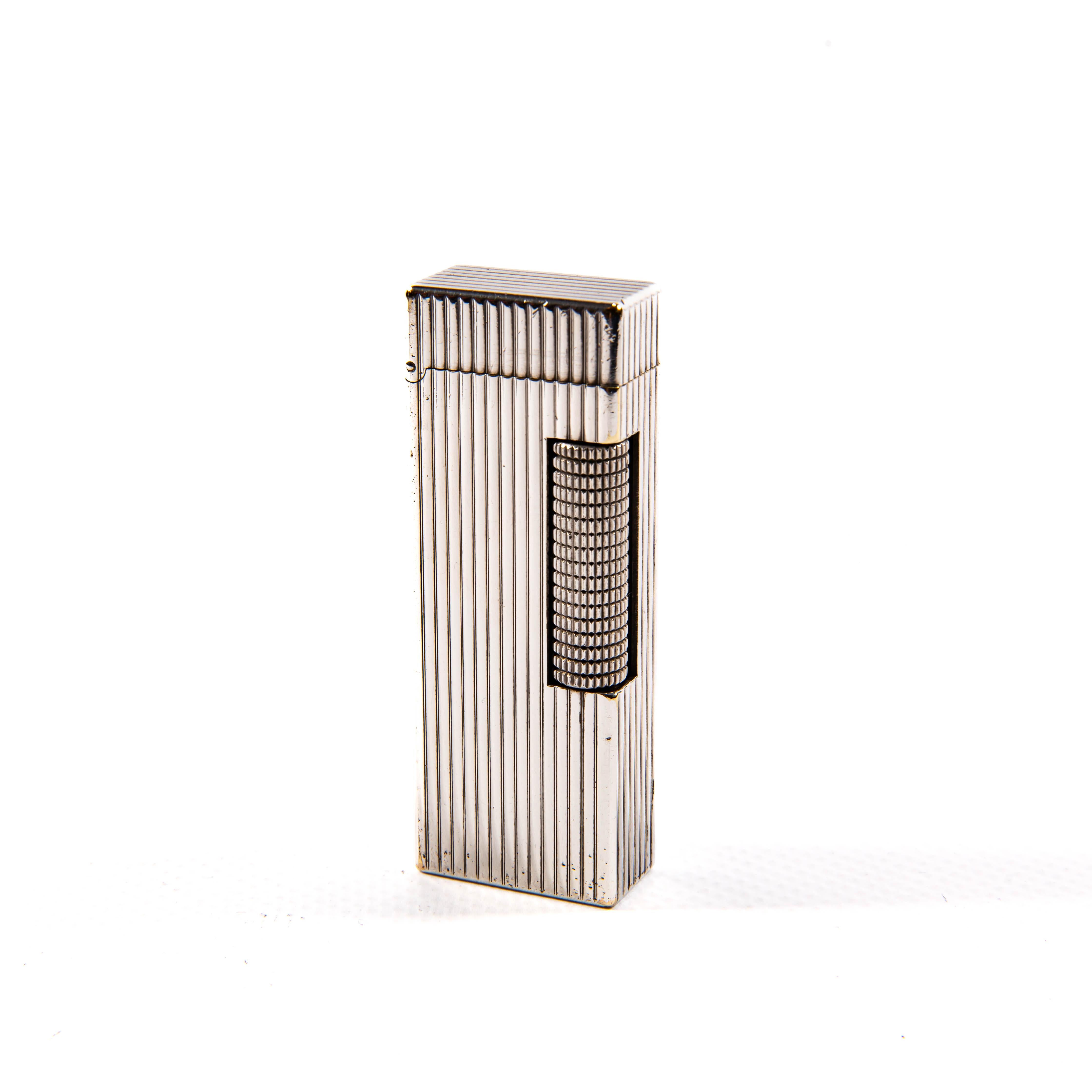Alfred Dunhill has been synonymous with luxury and innovation in lighter design since the brand's inception. Revered for their exquisite craftsmanship and distinctive style, Dunhill lighters have long served as both functional tools and elegant
