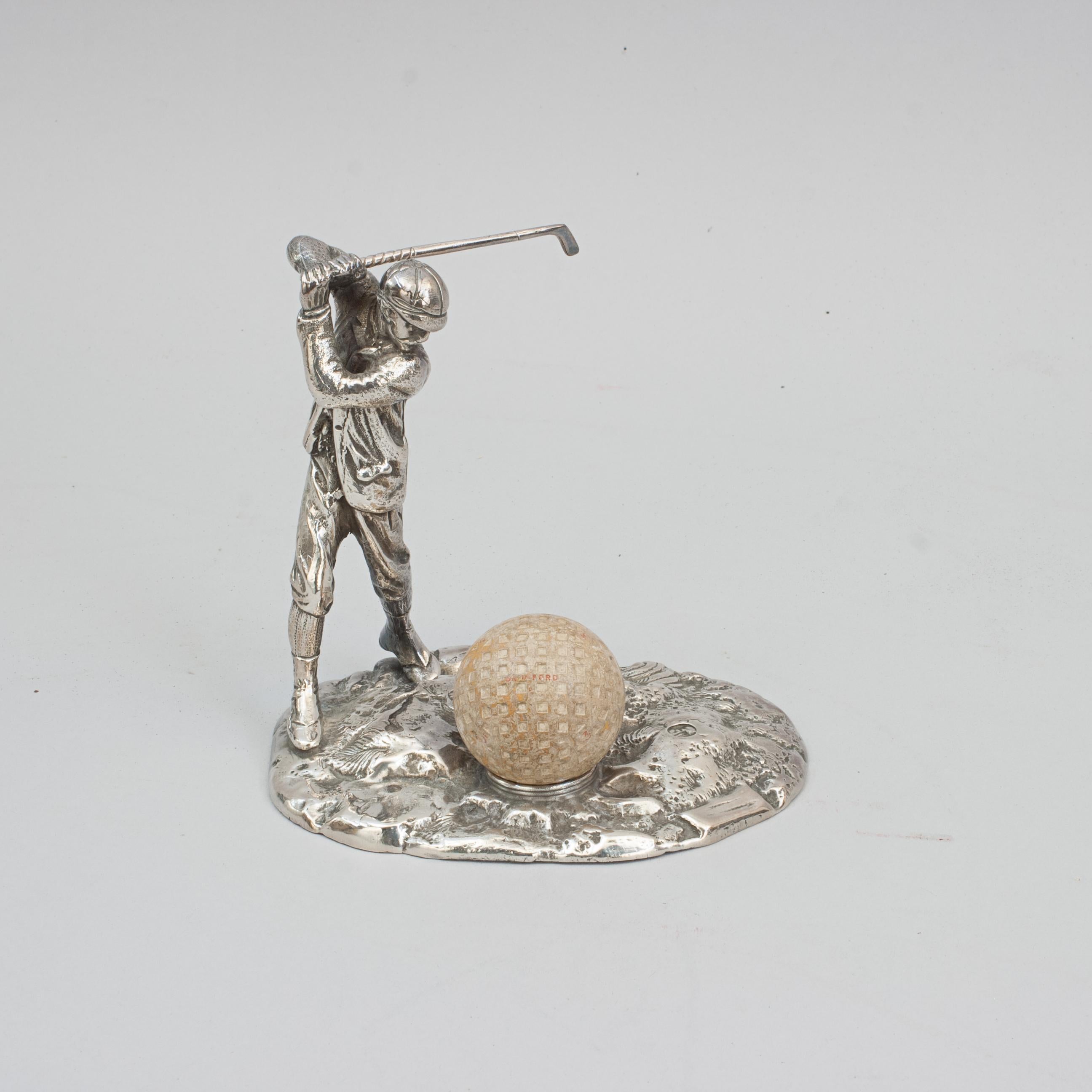 Silver Plated Hole In One Trophy.
A nice unusual golf trophy, ideal as an hole in one trophy. Started life as an inkwell, stamped Sheffield with indistinct makers mark. Golf ball is included in the price.

