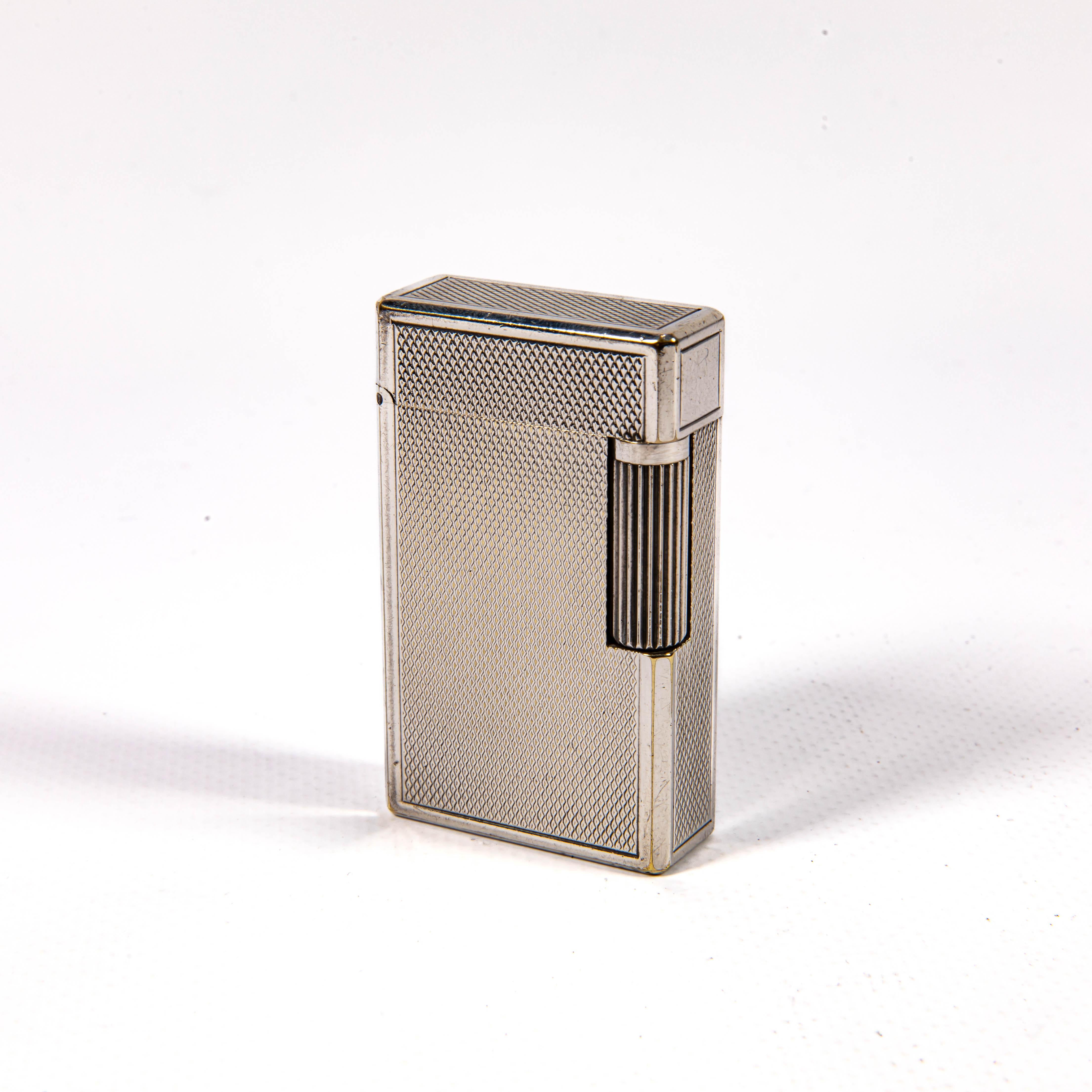 Embrace the renowned craftsmanship of S.T. Dupont, a brand synonymous with elegance and precision. Originating from France, S.T. Dupont has been a purveyor of luxury goods since the late 19th century, distinguished by its meticulous attention to