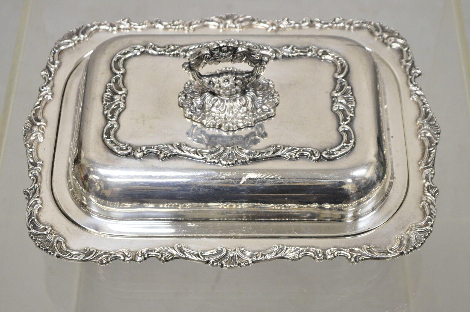 Vintage Silver Plate Victorian Style Ornate Lidded Covered Serving Dish. Item features divider to interior, ornate lid with removable repousse handle, very nice vintage item, great style and form. Circa Early to Mid 20th Century. Measurements: 5