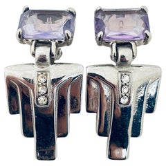Pendientes de clip de diseño vintage de plata y cristal morado