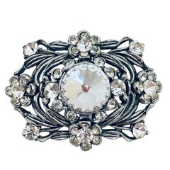 Broche vintage en strass argenté