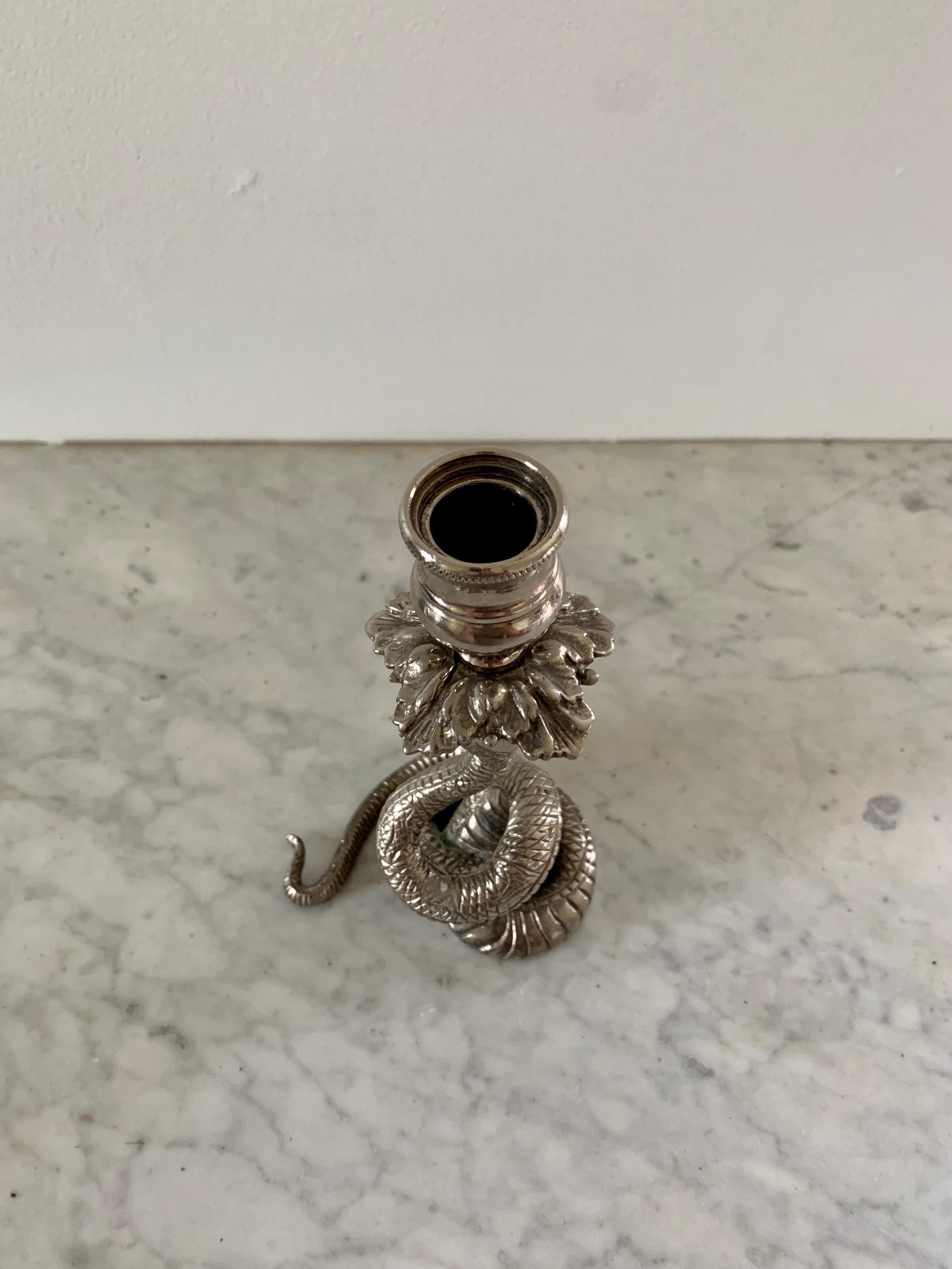 A wonderful Art Deco style silvered brass snake candle holder.

Circa mid-20th century

Measures: 4.5