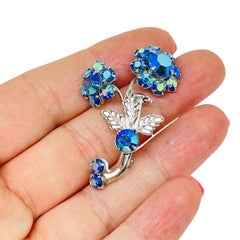 Vintage silver tone aurora blue rhinestones flower designer brooch