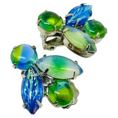 Boucles d
oreilles à clip vintage en verre bleu vert et ton argenté