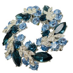 Vintage silver tone blue rhinestone wreath designer brooch
