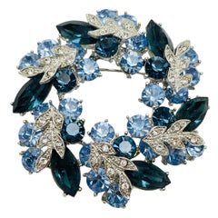 Vintage silver tone blue rhinestone wreath designer brooch