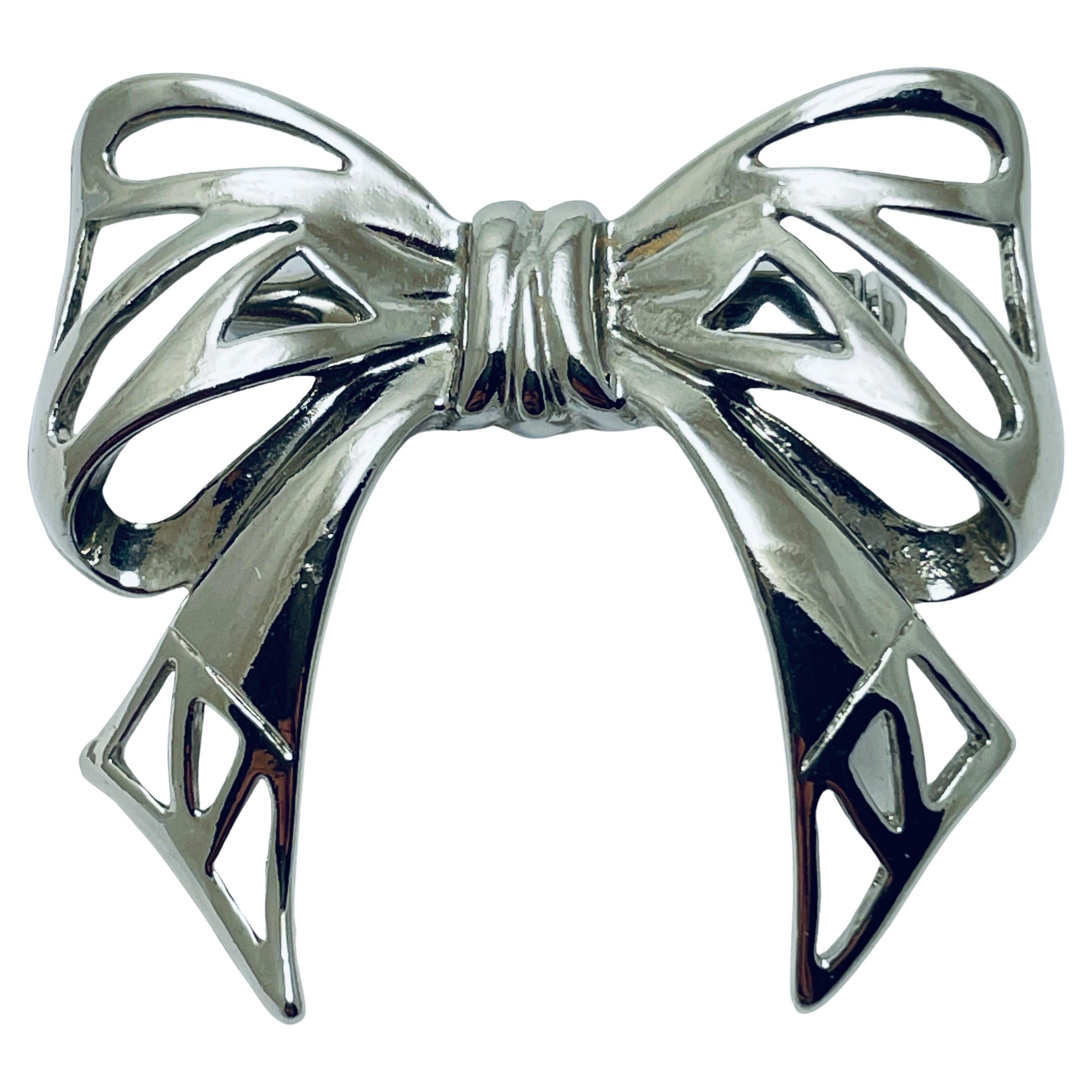 Vintage silver tone bow brooch For Sale