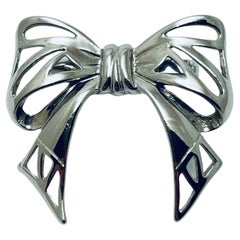Retro silver tone bow brooch