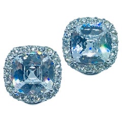 Piccoli orecchini a clip di design in cristallo color argento vintage