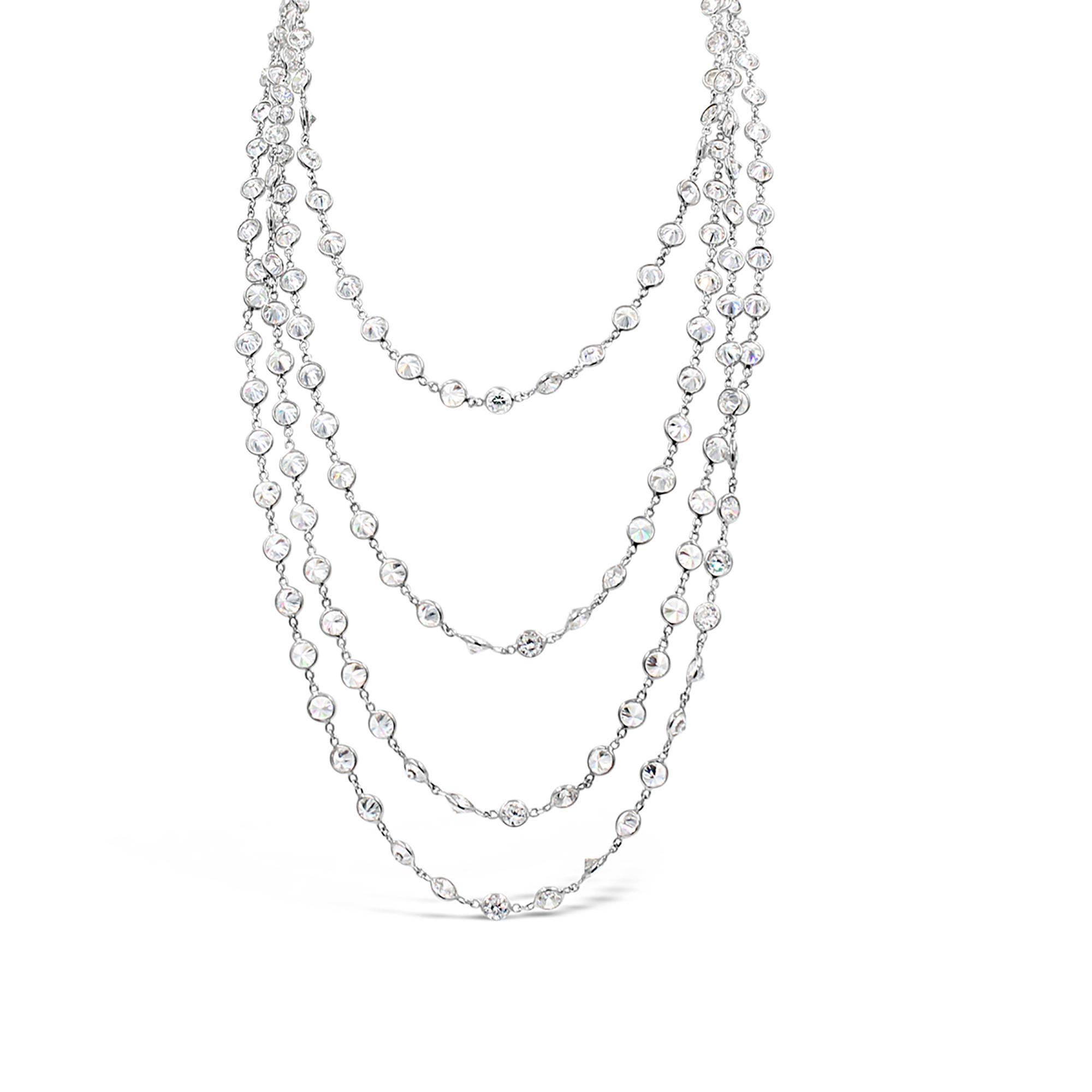 Collana vintage con diamanti in tonalità argento, circa 2004. Questo magnifico pezzo assomiglia a un diamante da un metro, ma in realtà è uno zircone da un metro.  È lucida, lunga e magnifica.  Con una lunghezza di 60