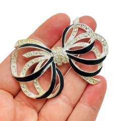 Vintage silver tone enamel rhinestone bow brooch