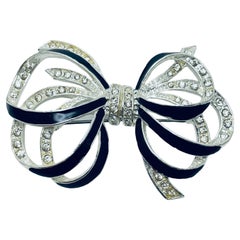 Vintage silver tone enamel rhinestone bow brooch