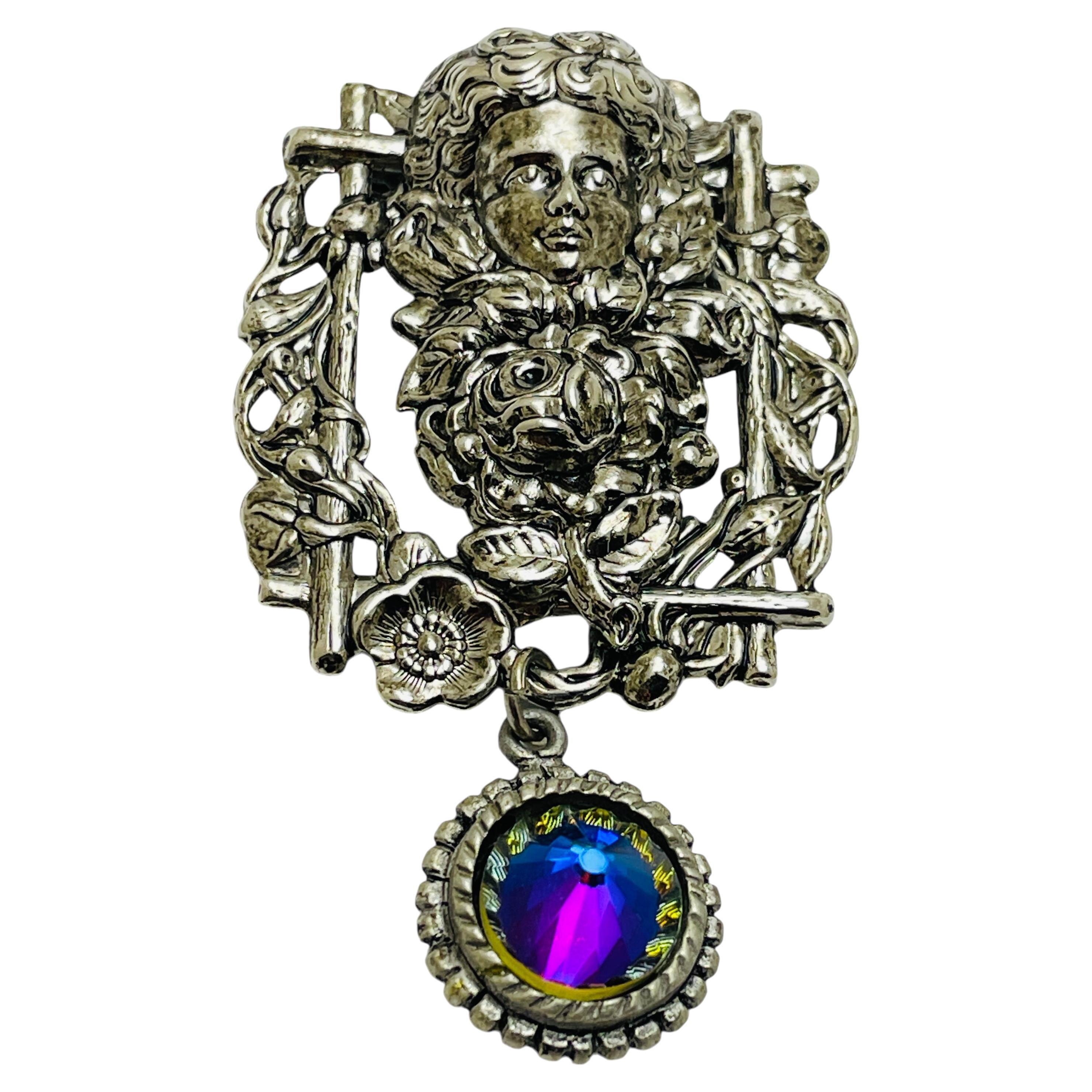 Broche vintage en verre argenté aux couleurs étonnantes