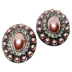 Boucles d
oreilles à clip vintage avec pierres en verre argentées.