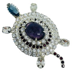 Broche vintage en argent avec pierres en verre pour tortue figurative.