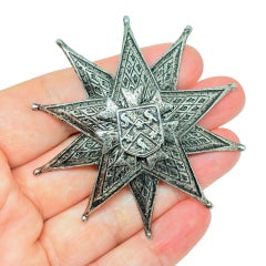 Vintage silver tone large star designer brooch