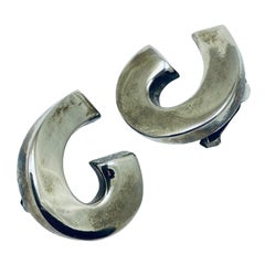 Orecchini a clip vintage in tonalità argento di design geometrico anni '80