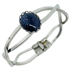 Vintage silver tone navy sparkle glass cabochon designer clamper bracelet