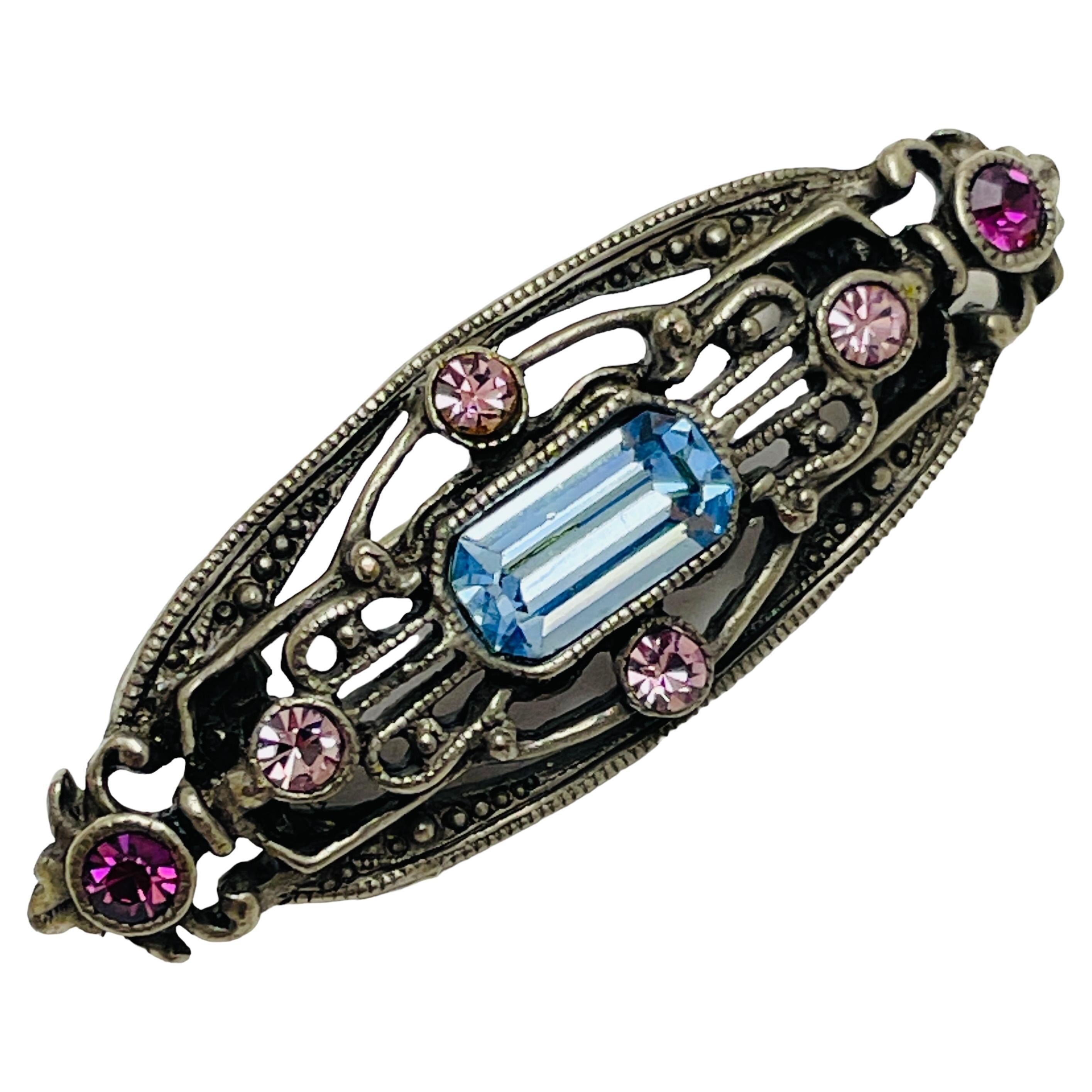Vintage silver tone rhinestone art deco style designer brooch For Sale