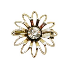 Used silver tone rhinestone designer brooch 