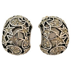 Vintage silver tone rhinestone star moon designer runway clip on earrings
