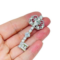 Vintage silver tone rhinestones key designer brooch