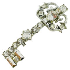 Vintage silver tone rhinestones key designer brooch