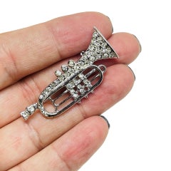 Vintage silver tone rhinestones music trumpet designer brooch