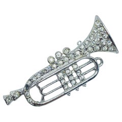 Vintage silver tone rhinestones music trumpet designer brooch