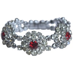 Bracciale vintage in argento, rosso rubino e strass trasparenti, circa anni '50