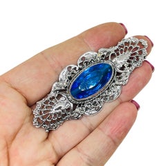 Vintage silver tone sapphire glass art deco style designer brooch