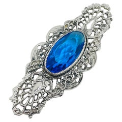 Vintage silver tone sapphire glass art deco style designer brooch