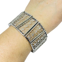 Vintage silver tone wide panel designer bracelet