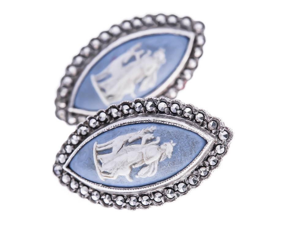 GEMMOLOGIST'S NOTES
A pair of gorgeous Wedgewood and marcasite earrings.. The perfect gift for someone with unpierced ears.

Each featuring a gorgeous Wedgewood cameo, that depicts 'Diana of Versailles' accompanied by a stag surrounded by a number