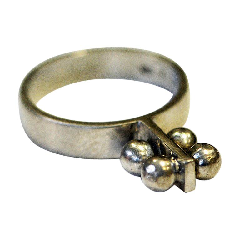 Lovely and special silvering with four small balls on top of each other. Sterling silver ring made by Michelsson Eftr Ab H in our hometown Enskede, Stockholm Sweden 1970s.
Perfect for stacking or to wear separately. For party or everyday use.