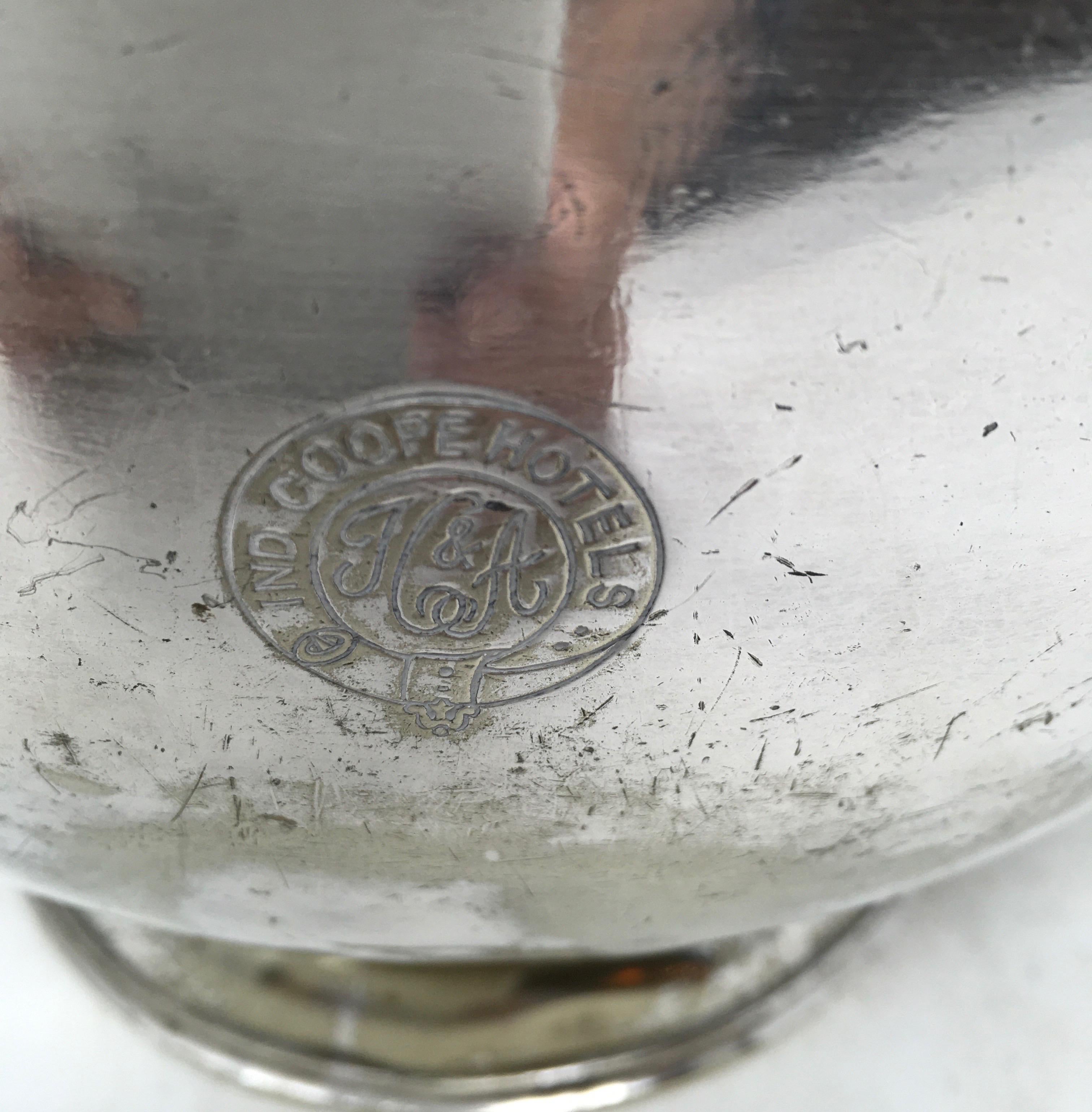This vintage silver plate soup tureen is marked A1, F & W, Ltd, EP on the bottom and inscribed on the side Ind Coope Hotels and initials J C & A. Silver soldered is a very heavy silver plate, usually triple plated over another type of metal to make