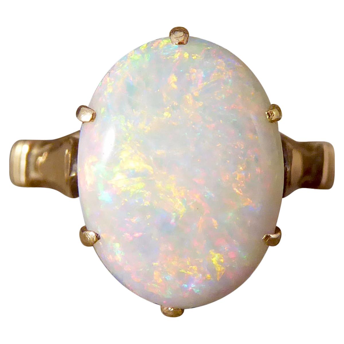 Vintage Single Oval Opal Ring in 9 Carat Yellow Gold with Heart Detailed Gallery