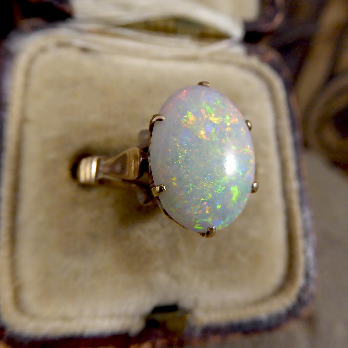 Oval Cut Vintage Single Oval Opal Ring in 9 Carat Yellow Gold with Heart Detailed Gallery