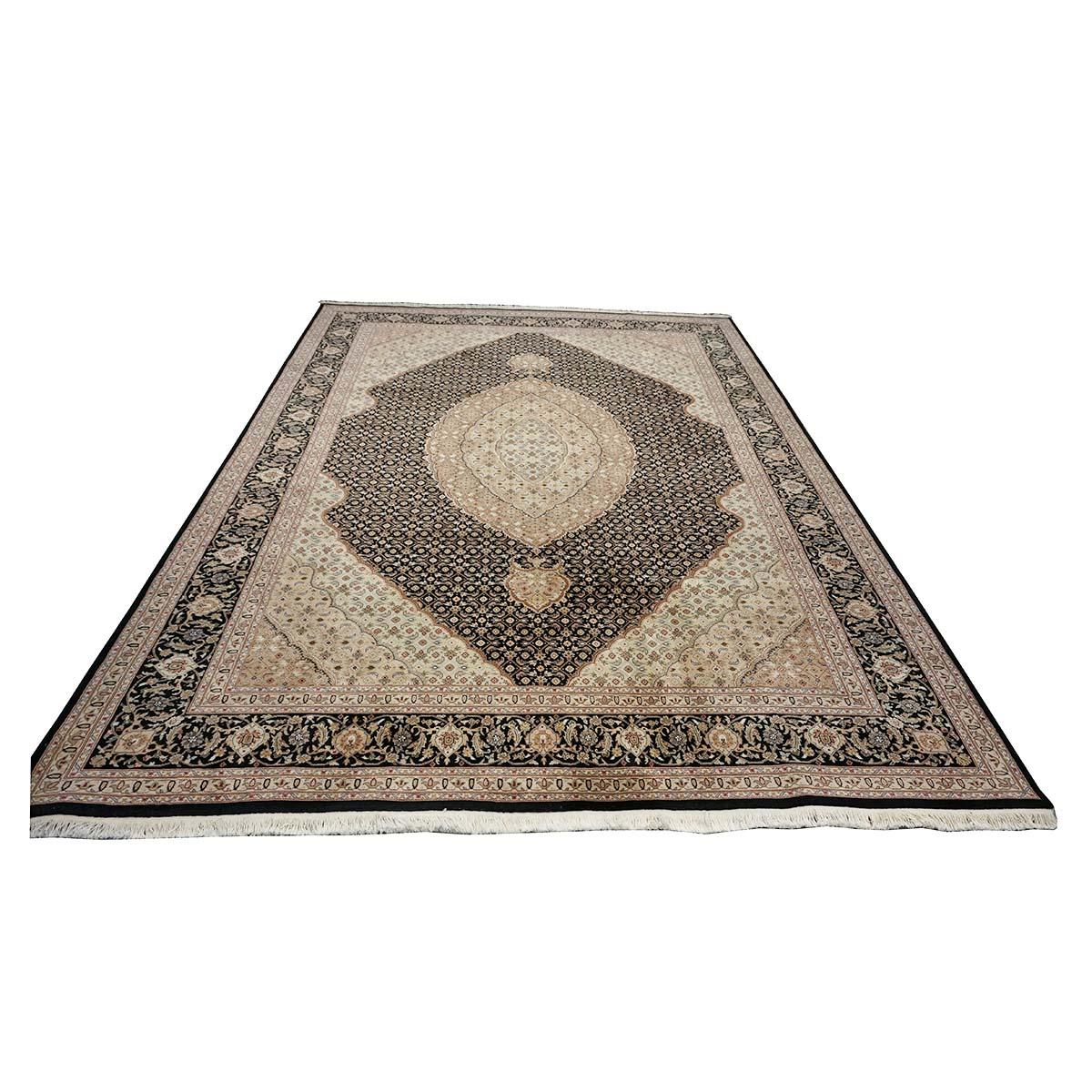  Ashly Fine Rugs presents a 1980s Vintage Sino-Persian Tabriz Mahi 9x12 Handmade Rug. Tabriz is a northern city in modern-day Iran and has forever been famous for the fineness and craftsmanship of its handmade rugs. Over the years, many countries