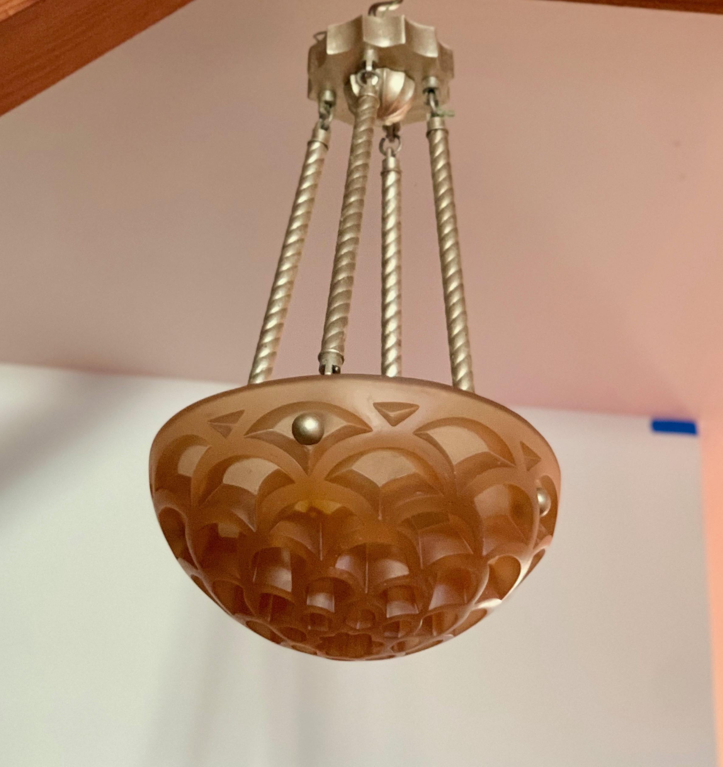 Gorgeous light fixture from the famed NY lighting manufacturer Sirmos, that specialized in resin and plaster, sculptural lighting of all sorts. The current iteration of 