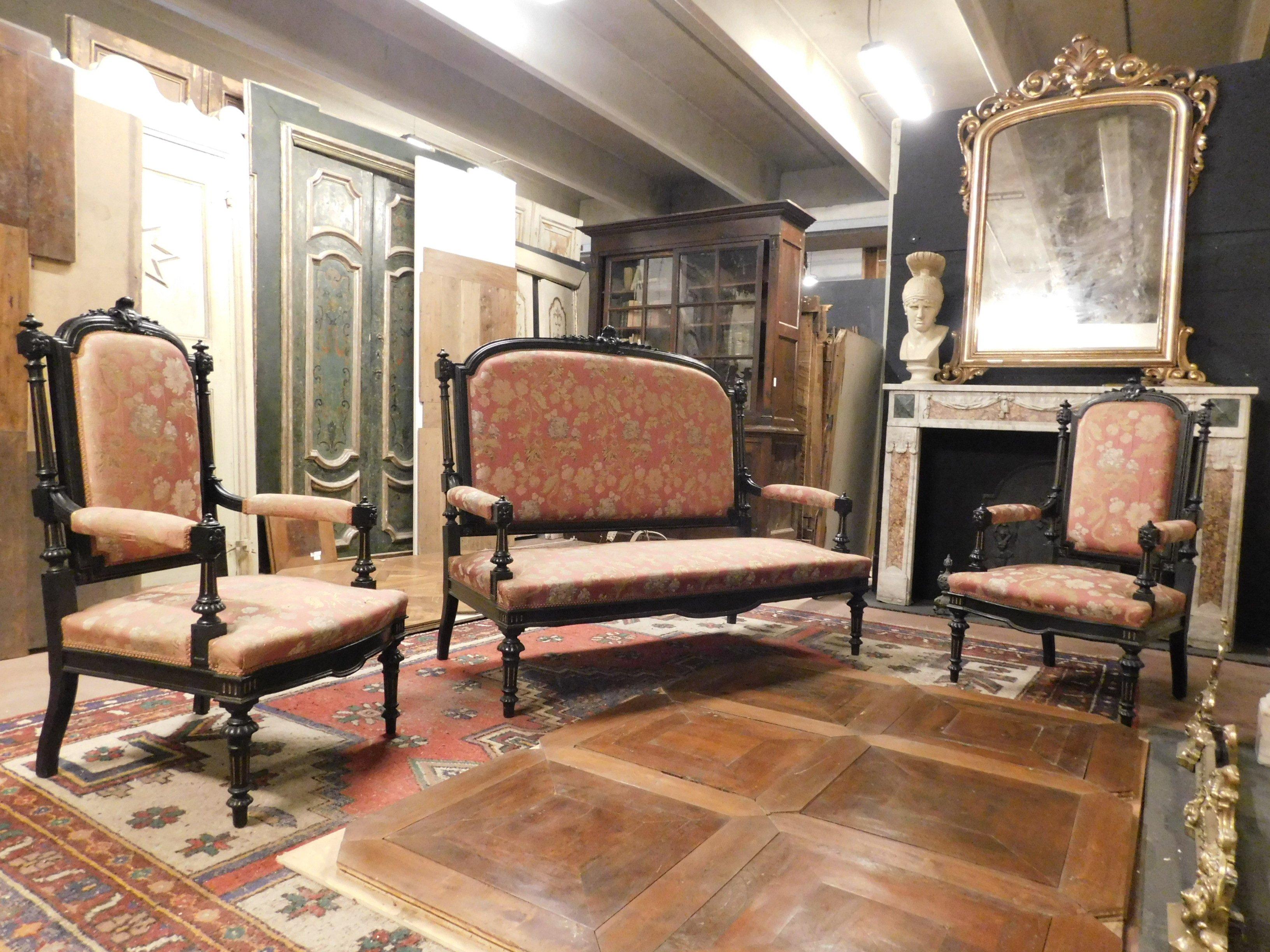 Vintage sitting room, composed of two armchairs and a sofa, composition in lacquered and sculpted dark wood, red damask fabric, produced in 1940 in Italy.
In very good condition, still with bright and well preserved fabric, ideal in a rich office
